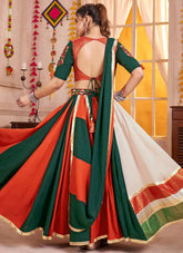 Green-orange dupatta with kutchi border and cotton tassel detailing